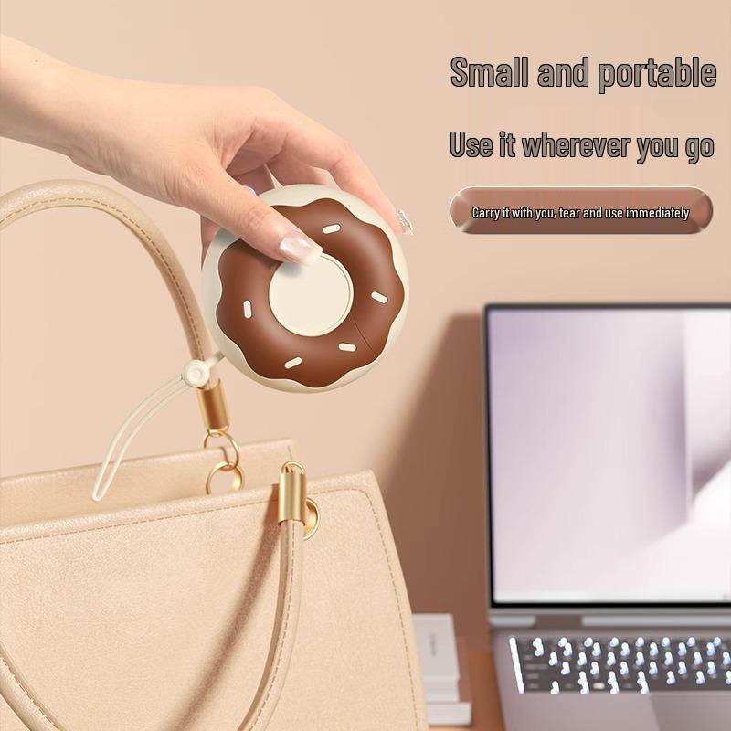 Portable Donut Lint Roller with Tearable Replacement Core for On-the-Go Hair and Lint Removal