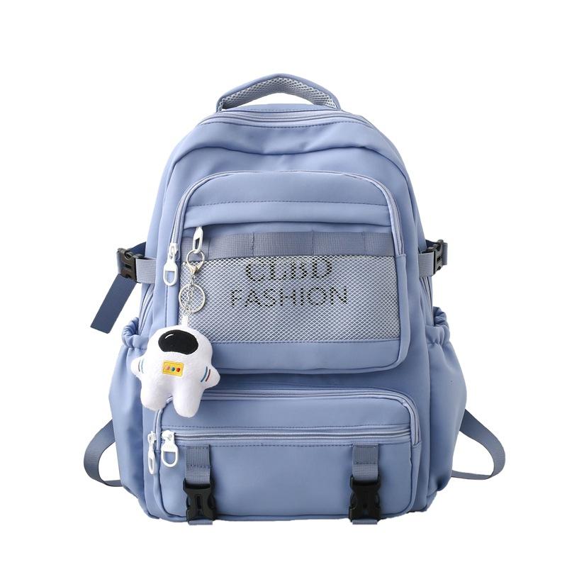 

Шкільний рюкзак контрастного кольору. Шкільний рюкзак для молодших школярів. Дорожній жіночий рюкзак синій