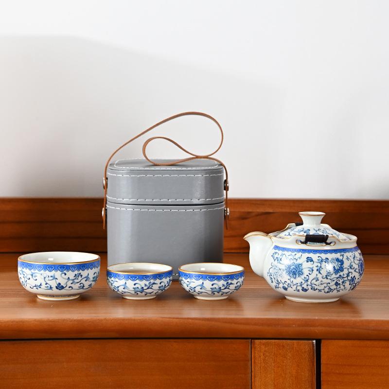 Ru kiln twisted branch lotus, a pot of three cups of travel tea set, a complete set of express cup outdoor portable bag, brewing teapot