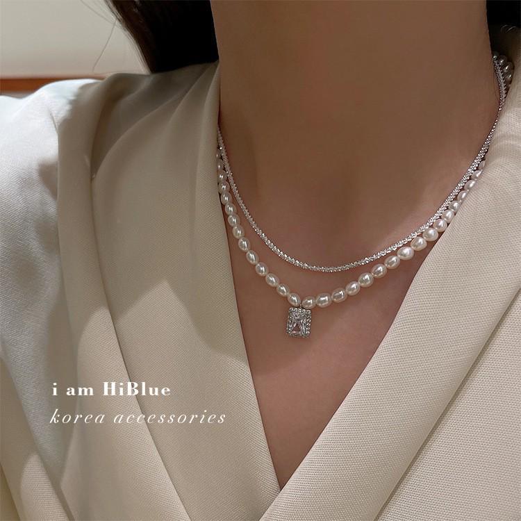 Elegant Silver Pearl Necklace: High-End Design for Women - Versatile and Chic Clavicle Accessory.