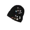 Korean version designer knitted hat children's sweet button face small wool hat autumn and winter bag head warm cold hat