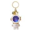 Creative Astronaut Starry Sky Keychain Pendant: Cartoon Doll Schoolbag Decoration, Perfect for Students or Couples.
