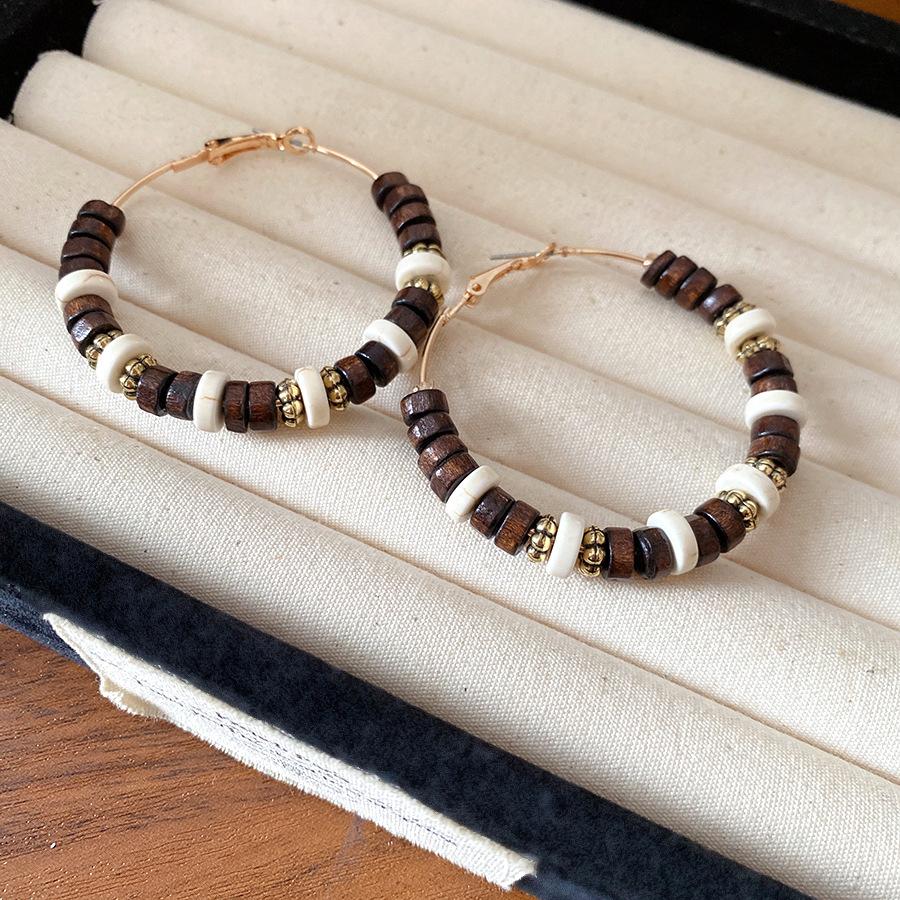 

Steel needle, wood bead, round earrings, retro ethnic style, simple earrings, fashionable commuter earrings, design sense, niche