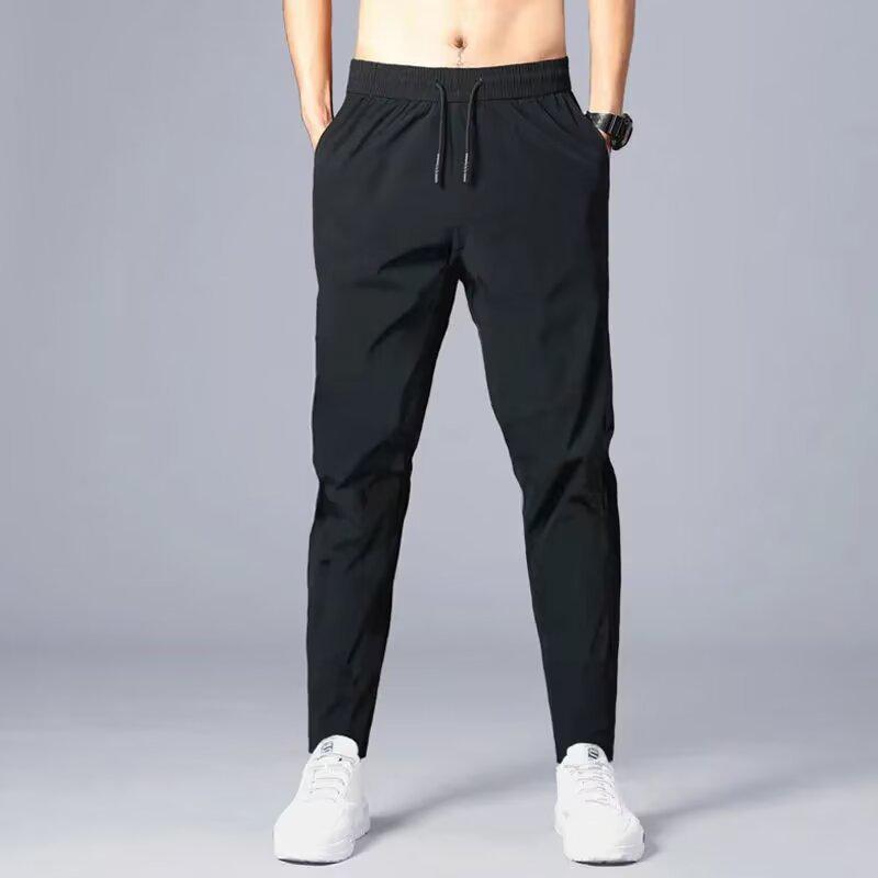 

Чоловічі повсякденні спортивні штани облягаючого крою в корейському стилі на весну/літо 2XL