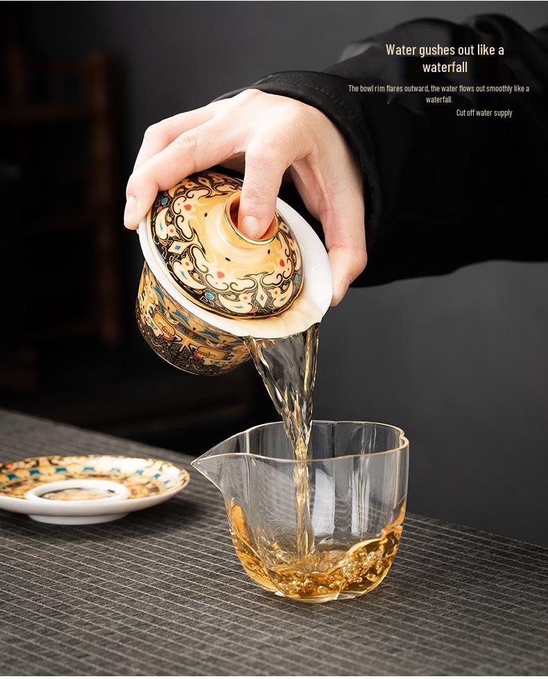 Rotating Sancai Gaiwan: Enamel Color Mutton Fat Jade Porcelain Tea Bowl with Lid for Kung Fu Tea Brewing.