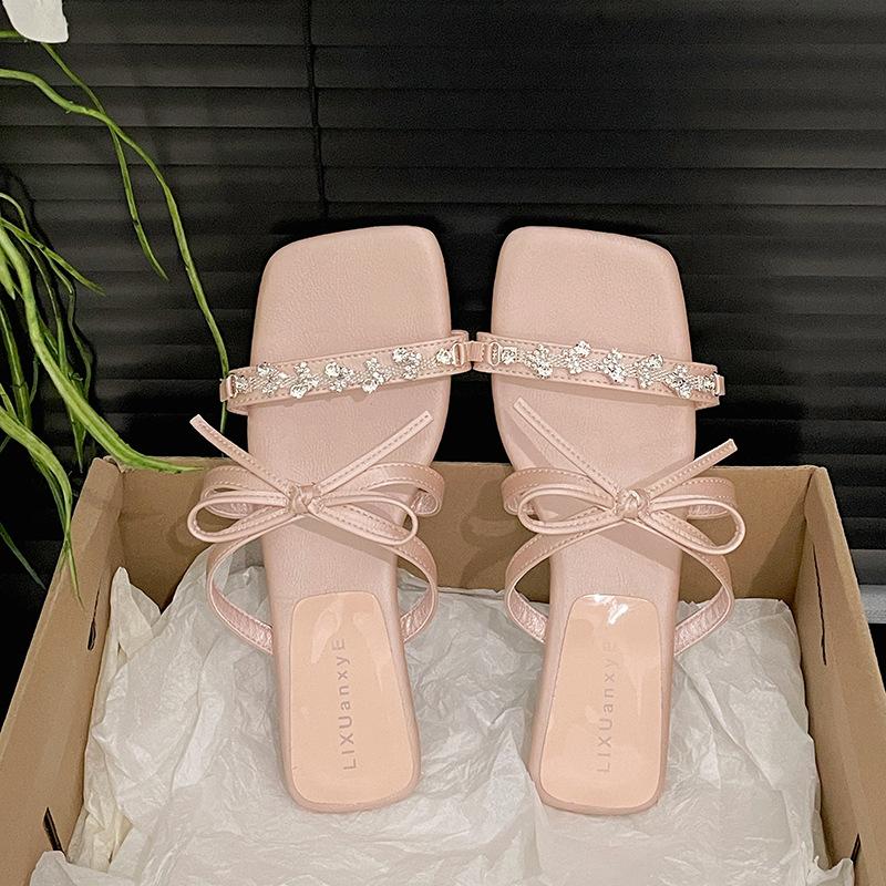 Black French fairy style low-heeled one-word slippers women's summer wear 2025 new models with skirts versatile cool slippers