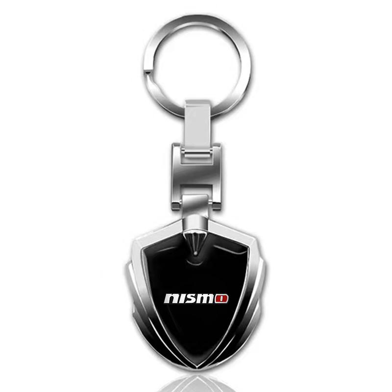1Pcs Car Emblem Stying Metal Key Rings Shield Shaped Keychain for Nissan Nismo GTR Altima Qashqai Almera Navara