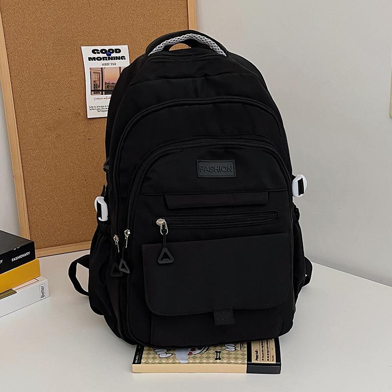 Korean version of simple backpack large capacity junior high school male and female students campus schoolbag backpack light