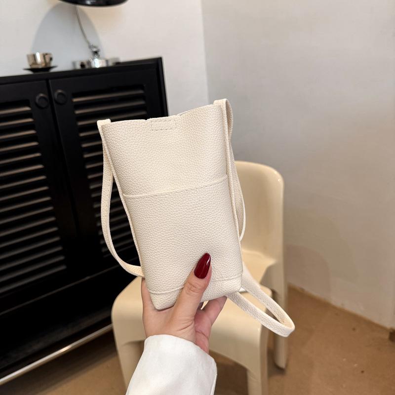 Solid color vertical mobile phone bag fashionable and simple versatile shoulder messenger bag advanced texture temperament casual women's bag