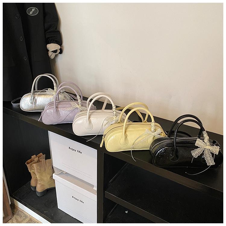 Portable High-end Fashion Pillow Bag Women's 2025 Spring and Summer New Simple Casual Shoulder Bag Niche Design Women's Bag