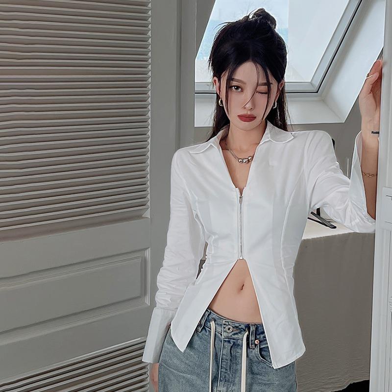 

Женские рубашки приталенного силуэта с темпераментными рукавами-разрезами, длинными рукавами и лацканами L