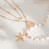 Modische mehrlagige Muschel-Anhänger-Halskette für Damen Urlaubsstil Handgefertigte Schlüsselbeinkette