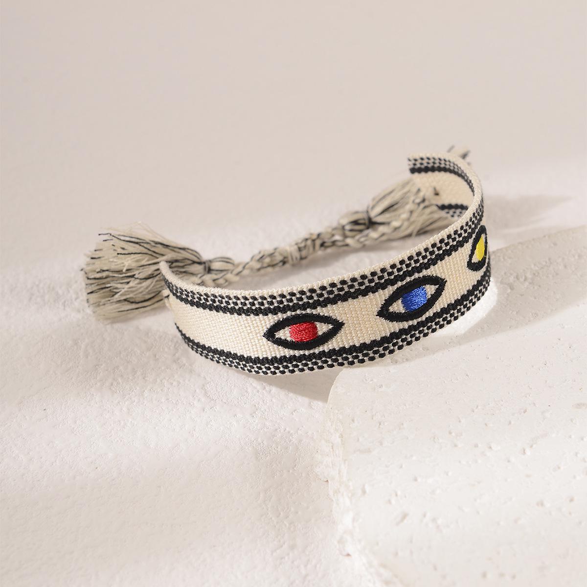 Handmade European Evil Eye Woven Bracelet with Tassel and Embroidered Layer - Lucky Charm for Women