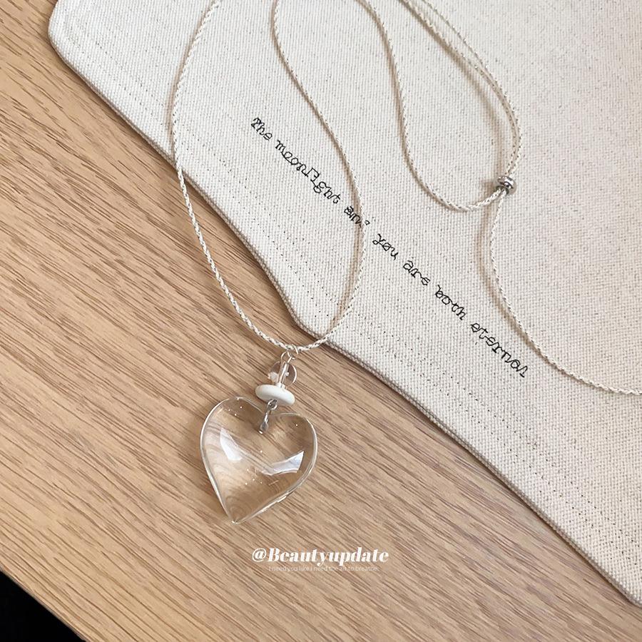 Elegant Geometric Glass Heart Necklace - Semi-Transparent Stone Look, Versatile Sweater Chain for Women
