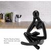 AUNMAS Thinker Reading Statue, Abstract Resin Sitting Figure Ornament for Living Room Cabinet Decoration (Black)