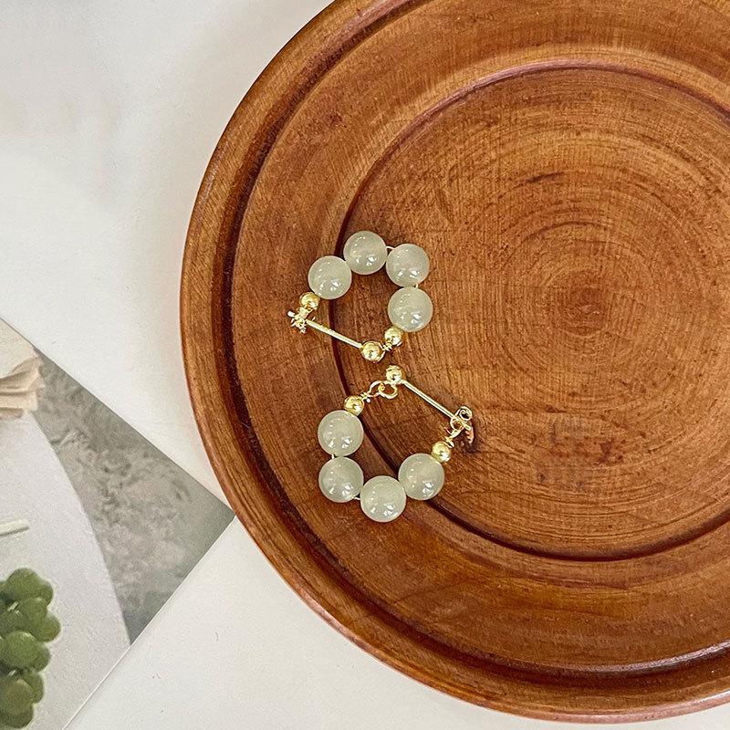 

Четыре серьги из нефрита Хотан для женщин, французский темперамент, элегантность, легкая роскошь, высококачественные ретро-серьги