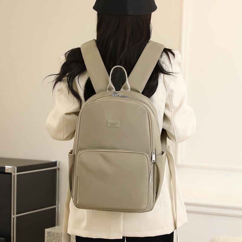 Schoolbag backpack women's European and American style nylon cloth leisure travel schoolbag 1011 new large capacity simple backpack women