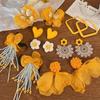Super fairy yellow flower earrings 2025 new small fresh and sweet stud earrings light luxury temperament seaside vacation style earrings