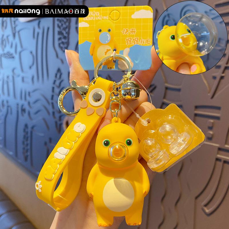 Dekompressions-Blasenblasen lustiges schwarzes Gesicht Milch Drache Schlüsselanhänger Anhänger niedliche zarte Dekompressionspuppe Entlüftungsspielzeug