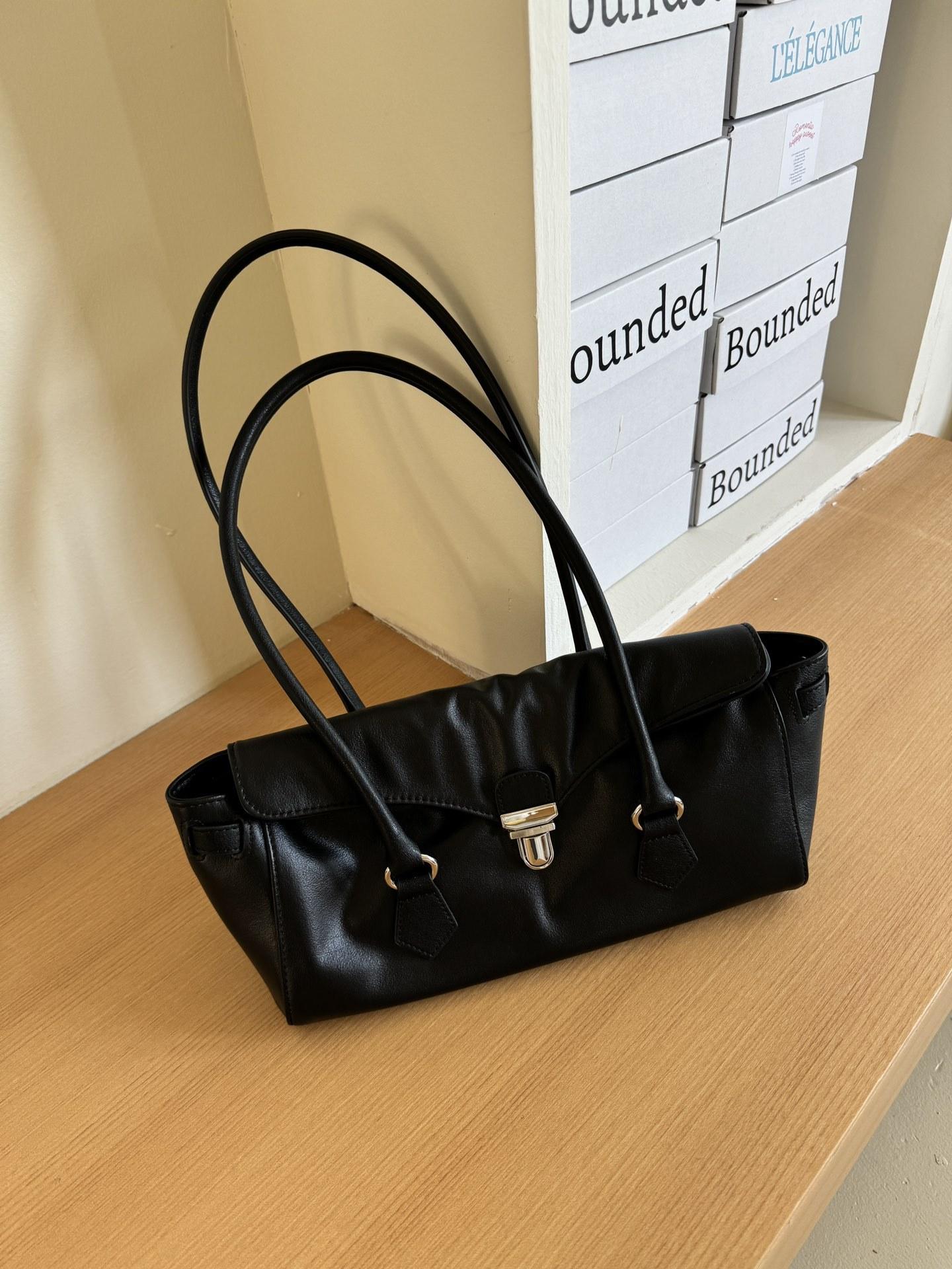 

Korean INS High-end Sensing Installation Sheepskin Small Van Package 25 New Retro Single Leather Handle Bottom Stitching Package 30×14×10cm чорний