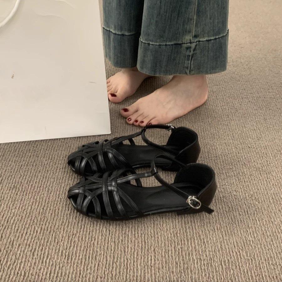 Retro woven hollow bag head sandals women's summer 2025 new one-word buckle bag heel flat Roman shoes