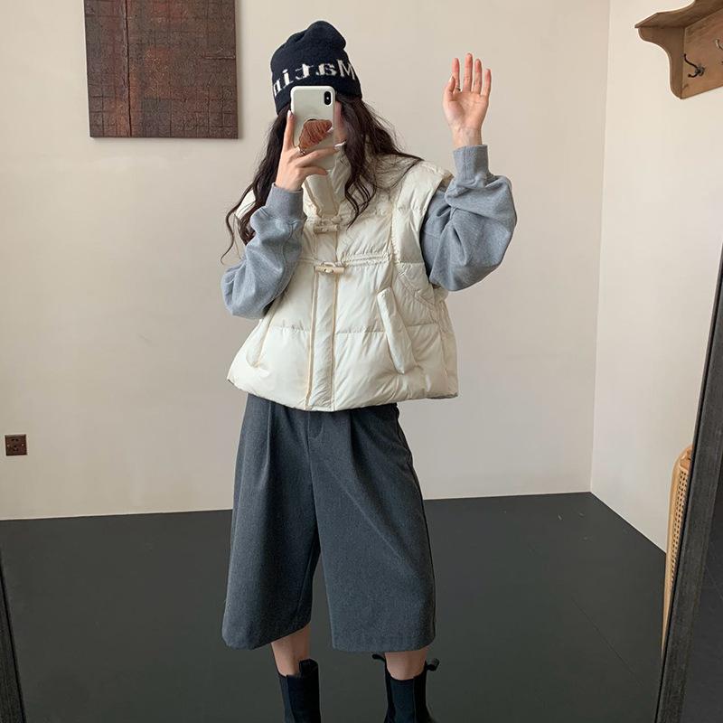 

Down vest women s 2025 autumn and winter fashion stand-up collar design sense wooden horn buckle light vest flying sleeve vest tide One size