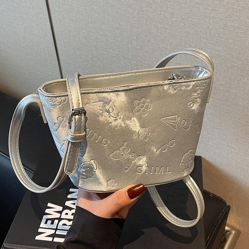 2025 New Simple Style Solid Color Cute Embossed Bucket Bag Niche Versatile Commuter Texture Shoulder Messenger Bag Women