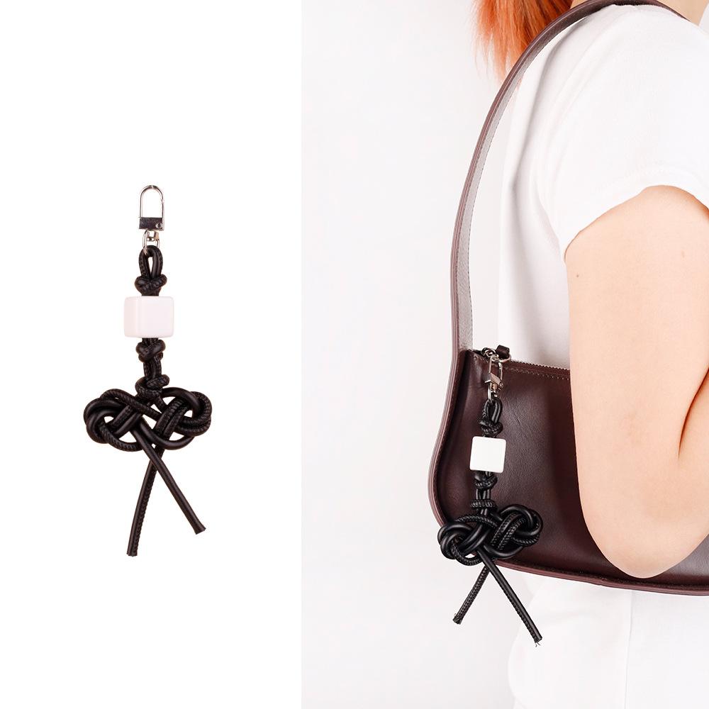 MIU series creative color hand-woven ruyi knot pu leather cord accessories bag pendant keychain