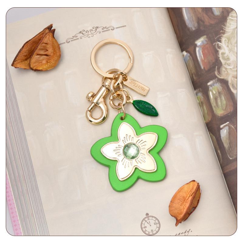 Marque de Luxe Sac Fleur Pendentif Mode Élégant Métal Cuir Créatif Exquis Polyvalent Mignon Accessoires Sac Porte-clés