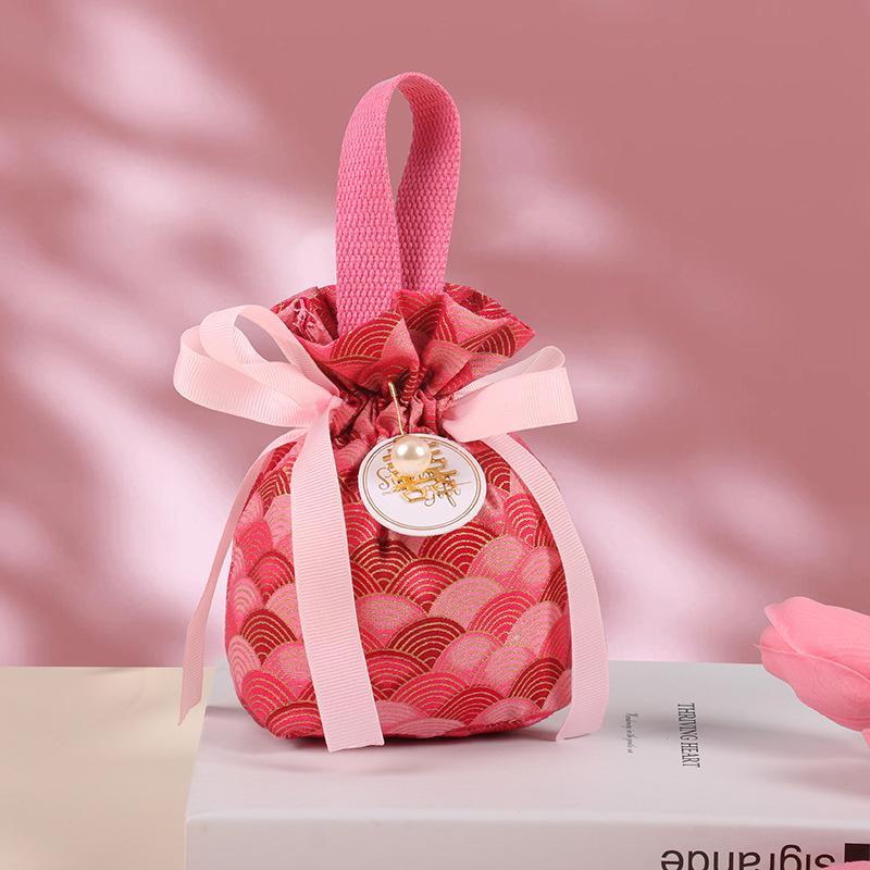 Hochzeits-Süßigkeitstüten im chinesischen Stil und knitterfreie Handtaschen-Gastgeschenke