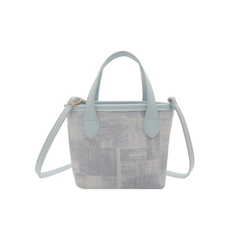 

New Korean version of highvalue bucket bag women s new simple commuting handbag casual bag
