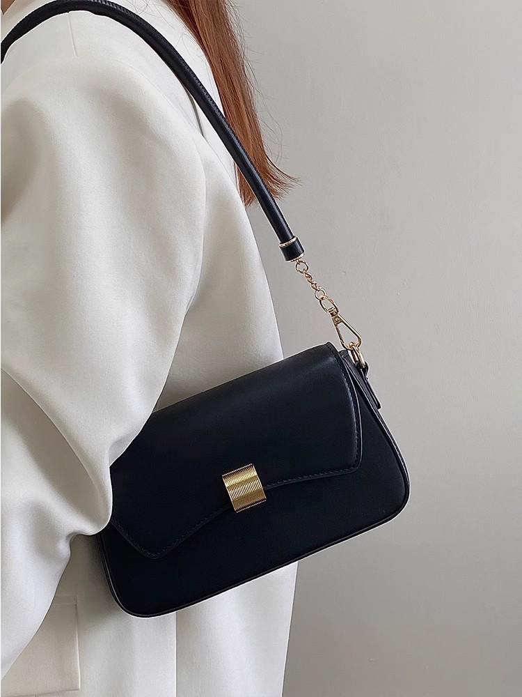 Retro 2026 Women's Baguette Bag: High-End Niche Design, Shoulder & Crossbody Style, Compact and Stylish