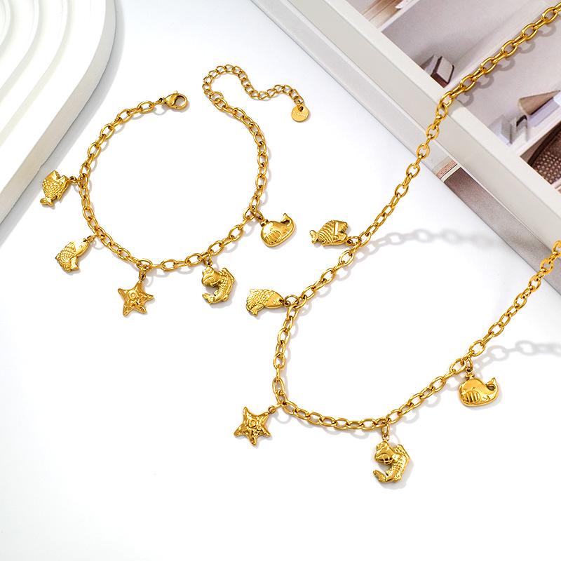 Gold-Plated Titanium Ocean-Inspired Necklace & Bracelet Set with Starfish and Fish Pendants - Versatile Women's Jewelry