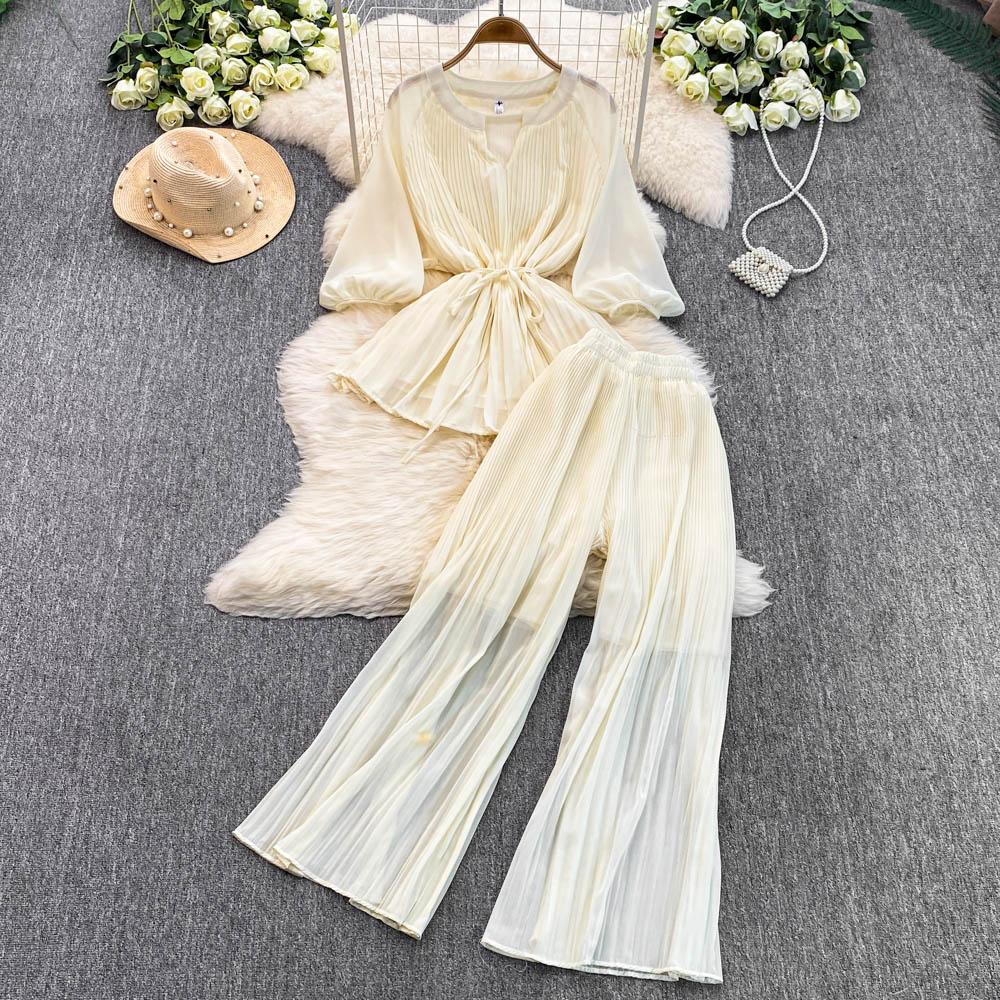 

Весна-лето Женский плиссированный комплект из двух предметов Элегантная шифоновая блузка с V-образным вырезом и драпировкой + широкие брюки с высокой талией Костюм из 2 предметов для женщин Новый One Size абрикосовый