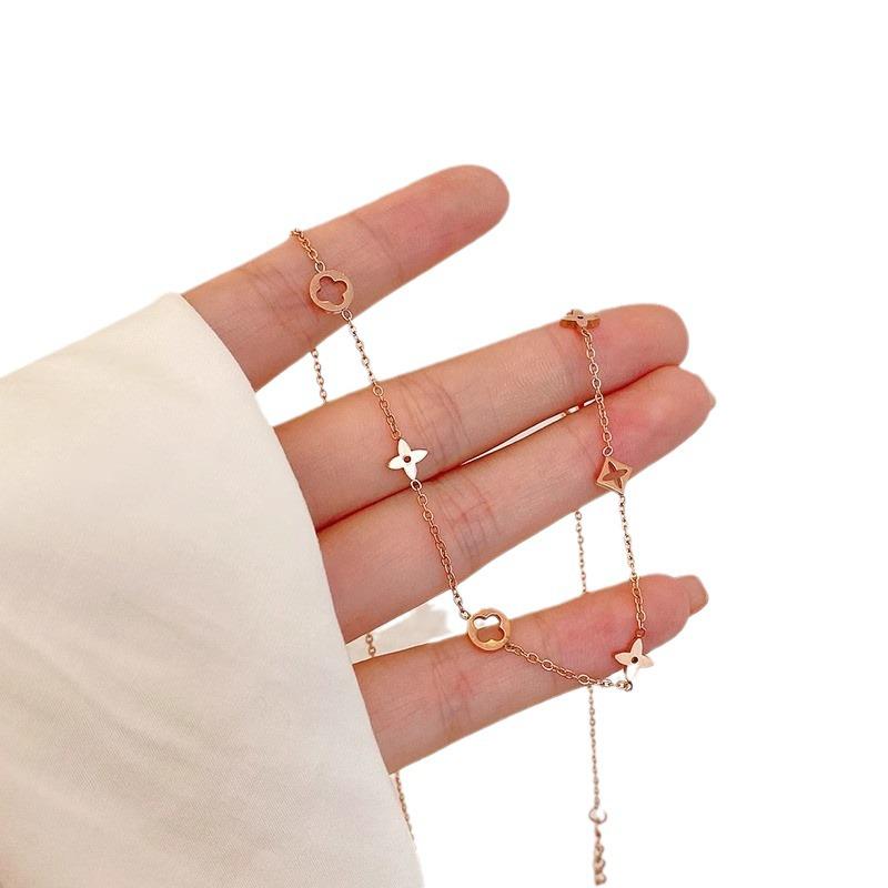 Titanium Steel Four-Leaf Clover Necklace - Classic Floral Design for Women