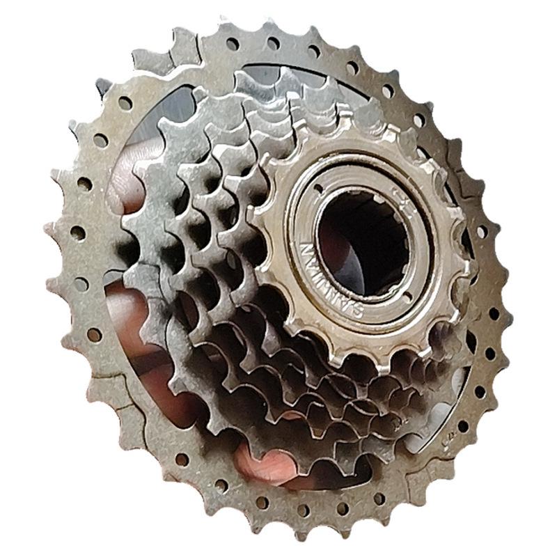 Vélo de montagne 27 vitesses avec poignées tournantes, roue libre indexée 7 vitesses, pignons arrière 9 vitesses, roue libre bruyante 8 vitesses et moyeu à cassette à changement de vitesse