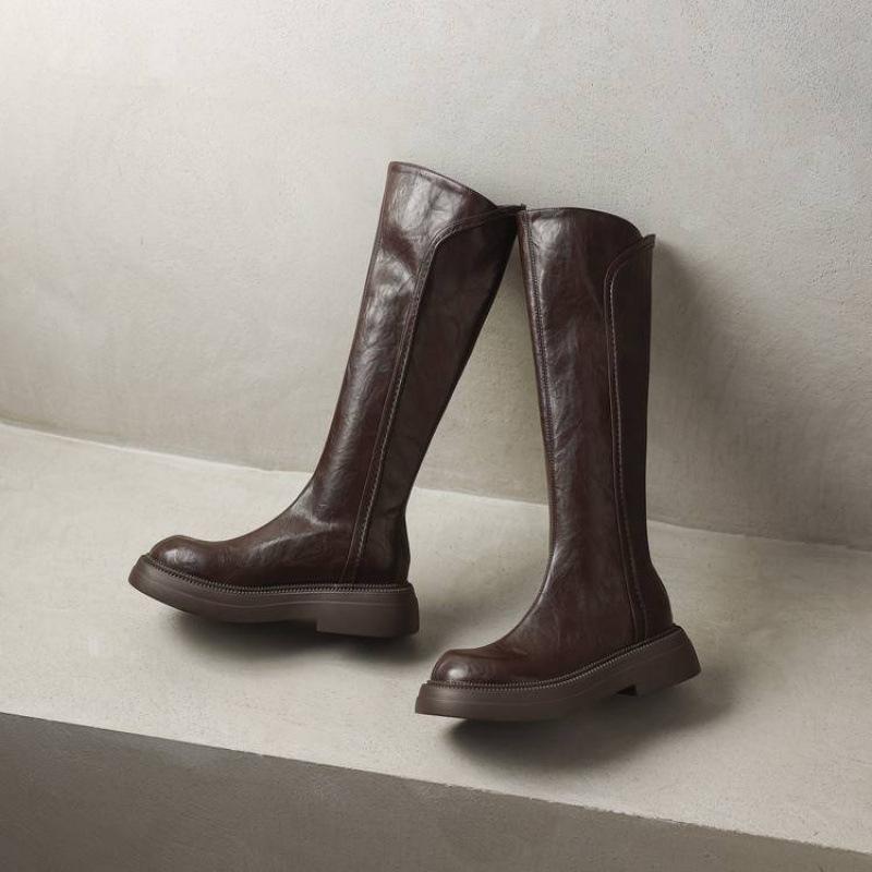 Korean version of rubber sole thick sole non-slip solid color Martin boots rear zipper comfortable middle heel round head autumn and winter hi