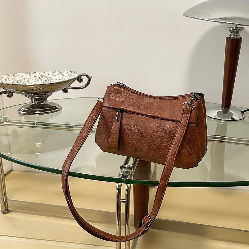 

Fashion crossbody bag new soft leather underarm bag simple mother bag large capacity shoulder bag niche design bag коричневий