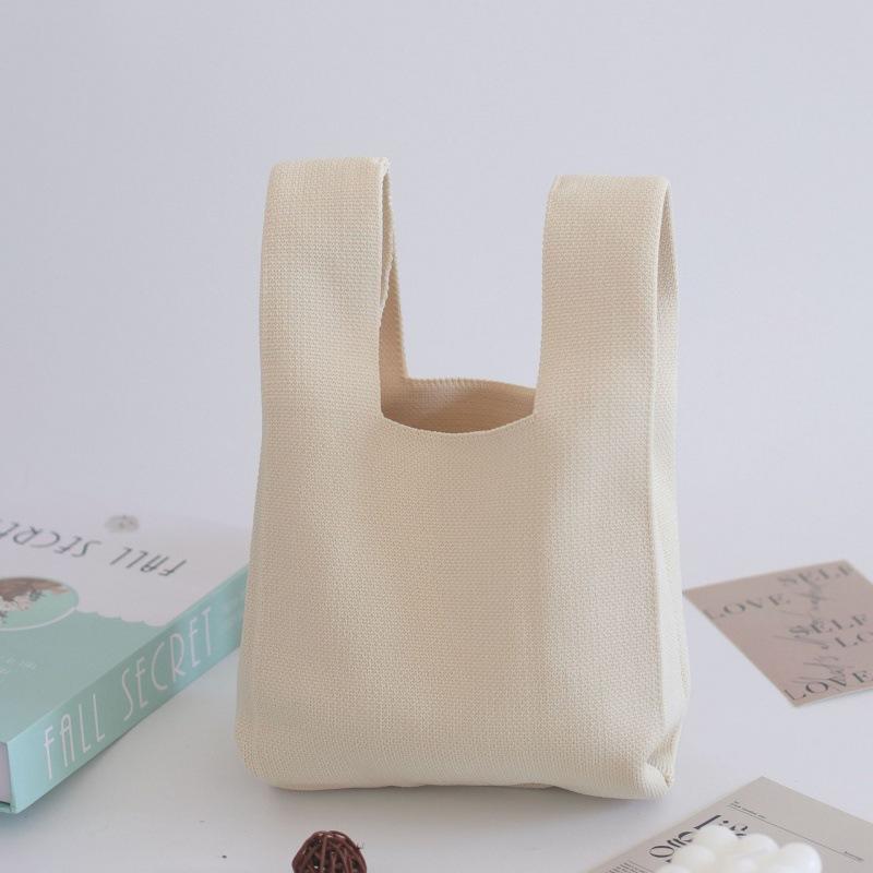 Ins Internet celebrity handbag women's knitted wool bucket bag Japanese and Korean version versatile hand carry casual tote bag box lunch bag