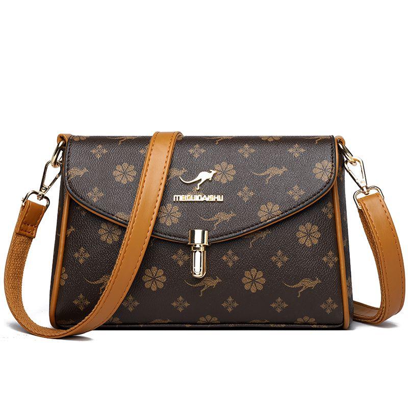 

Kangaroo Middle-Aged and Elderly Genuine Leather Ladies Bag Brown Rose with Yellow