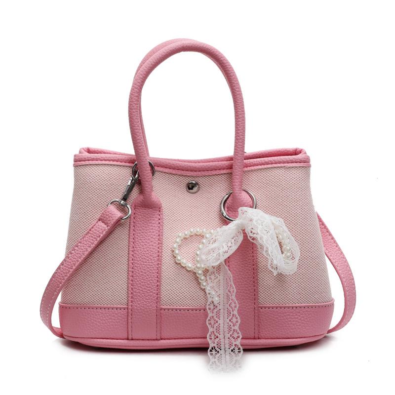 Wholesale Korean version of casual niche contrasting color portable bucket bag commuting versatile simple personality messenger women's bag