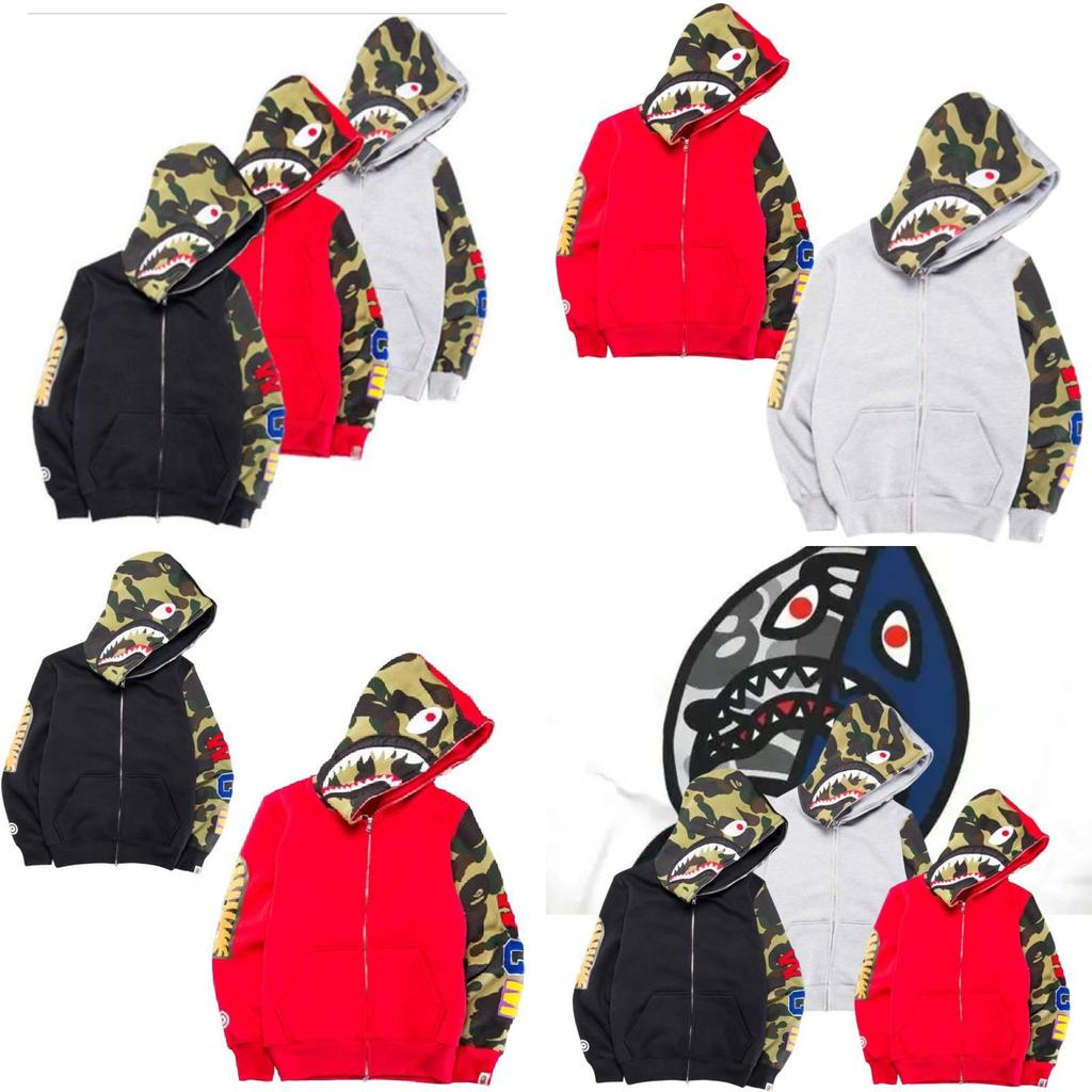 Sweat à capuche zippé tendance camouflage requin pour hommes et femmes, confectionné dans un tissu confortable en mélange de coton.