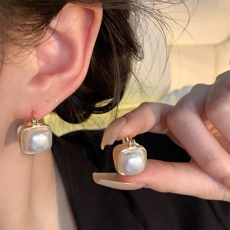 S925 Silver Needle Luxury Pearl & Cat's Eye Stone Earrings for Women – Elegant, All-Match Design.