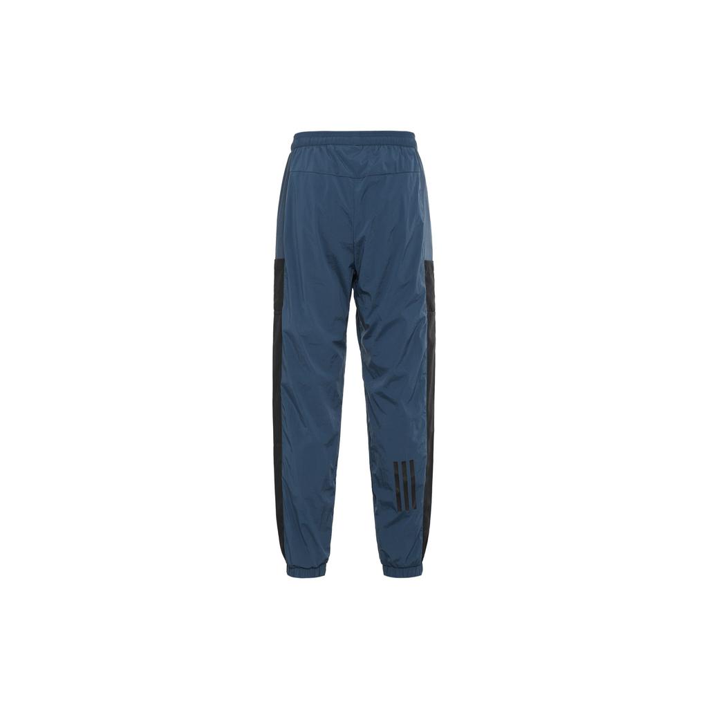 Adidas Pánské modré tepláky s logem z prošívaných písmen GN0783