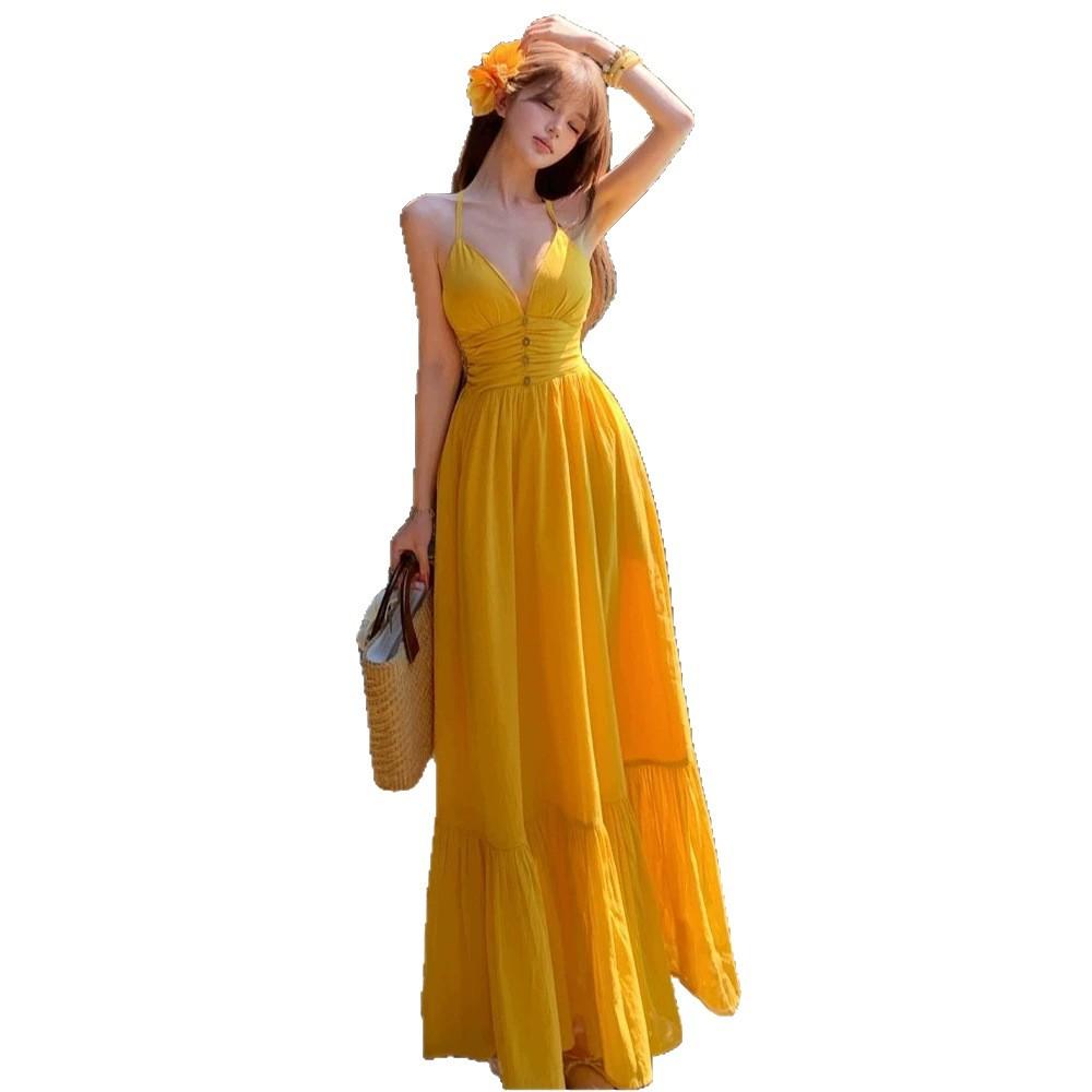 Beautiful yellow v-neck suspender dress for travel and vacation, women's waist and thin swinging seaside dress