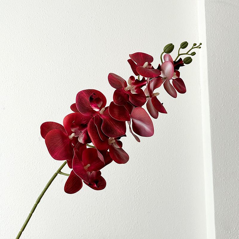 Bionic Phalaenopsis Floral Arrangement: Realistic Fake Flower Decor for Living Room or Dining Table.