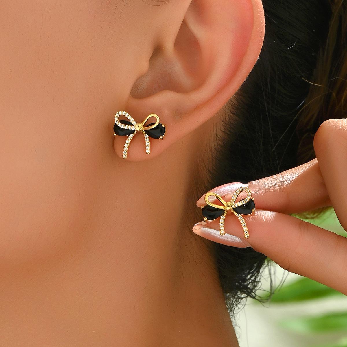 

ins simple bow design women s earrings personalized niche asymmetrical inlaid zircon stud earrings