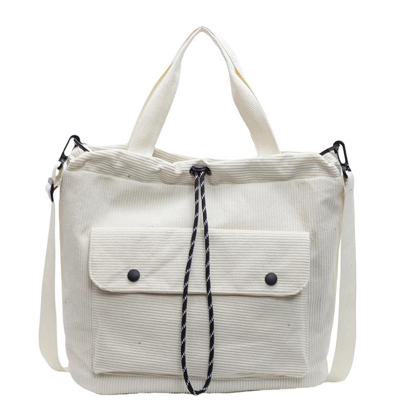 

Fashion drawstring bundle handbag 2025 new solid color simple shoulder bag large capacity casual women s messenger bag one size fits all