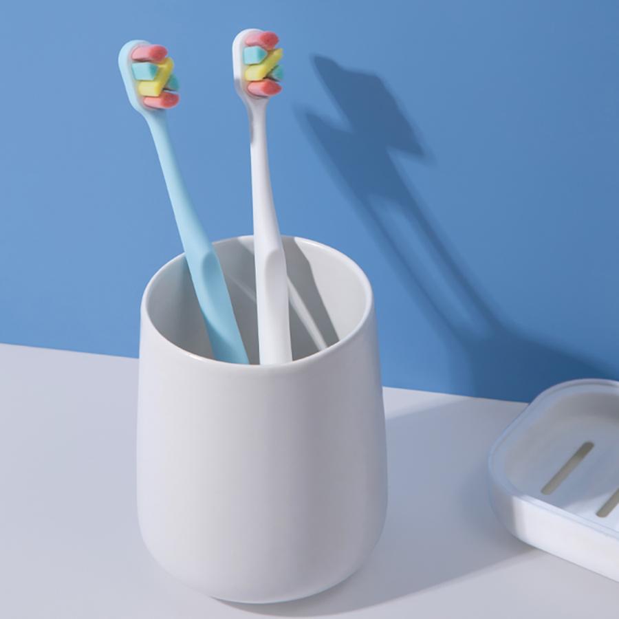 Four-color adult toothbrush, individually packaged, soft and dense bristles to reduce gums