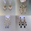 Exquisite Zirconia Butterfly & Water Drop Tassel Earrings – Retro Court Style with High-End Luxury Appeal